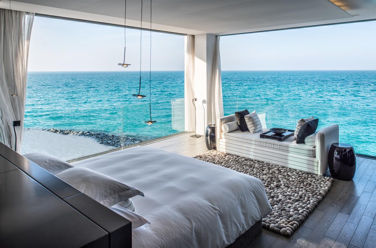 Hotel Nurai Island, Saadiyat Abu Dabi Habitación foto The bedroom of a private villa at the resort